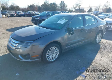 2010 Ford Fusion Hybrid z USA, uszkodzony, nr VIN 3FADP0L3XAR143399